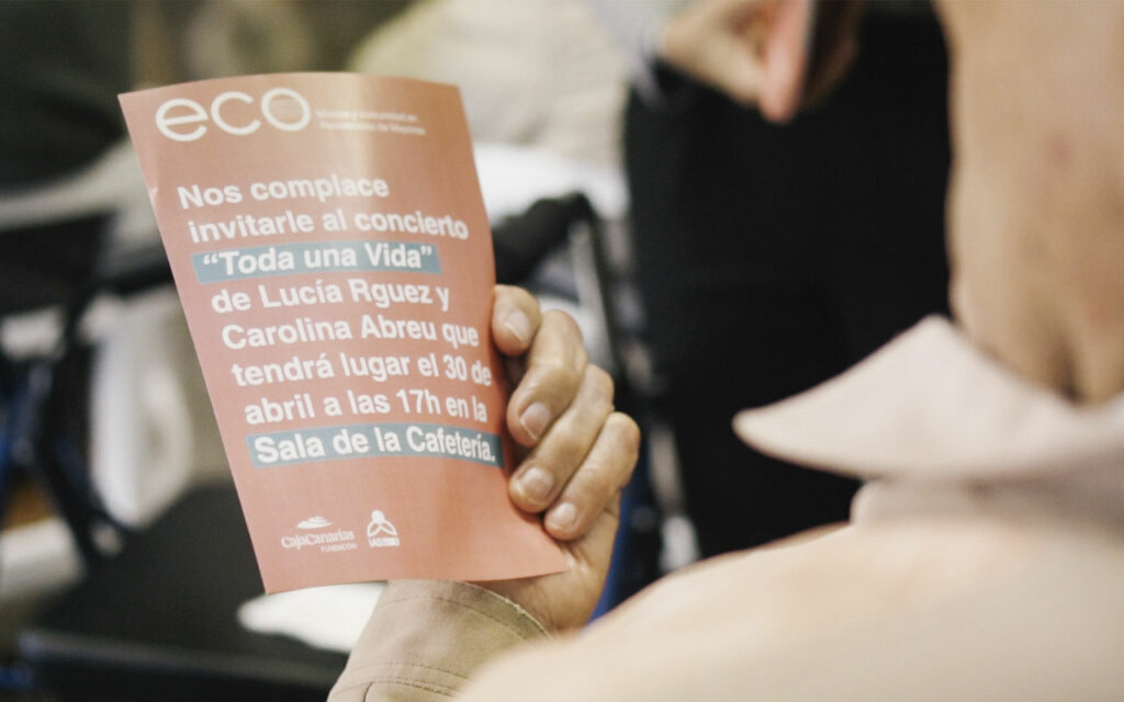 Cartel de invitación al concierto final de ECO. Música y comunidad en Residencias de Mayores. Residencia de Mayores de Ofra, 2019. Fotografía de Iván Delgado (Nevus Visual).